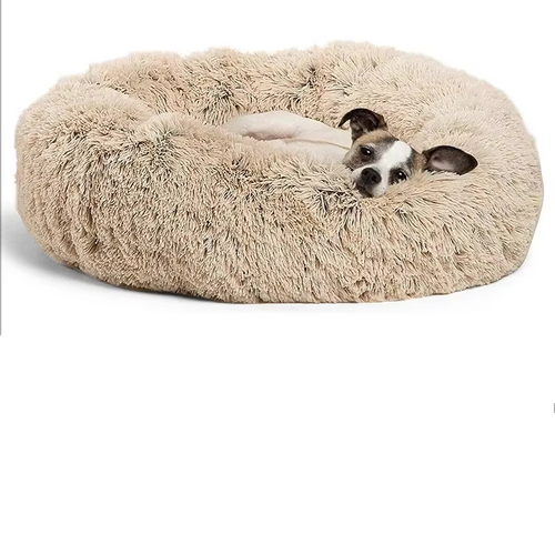 Beige fluffy pet bed with a dog lying on it, and a white background.
